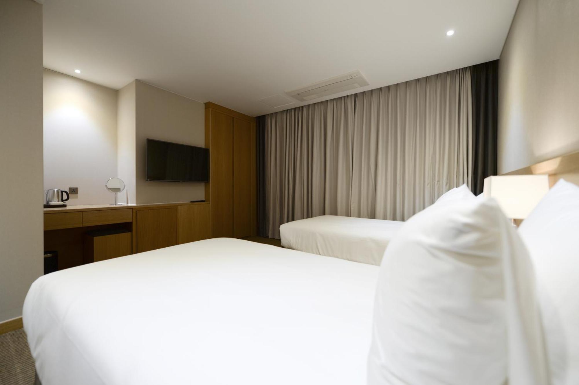 Hotel New Oriental Myeongdong Soul Pokoj fotografie
